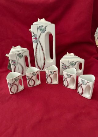 Antico set da caffè in porcellana decorato