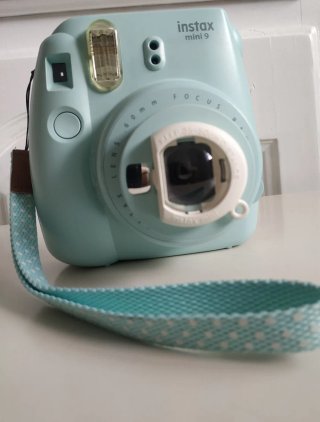 Cámara Fujifilm Instax Mini 9 con aumento