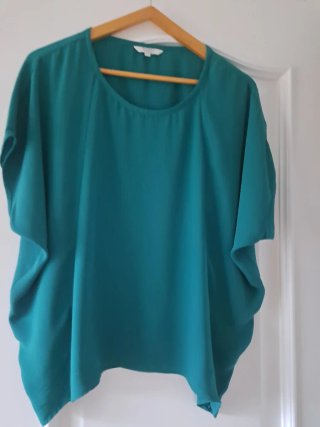 Blusa Teal Manga Murciélago