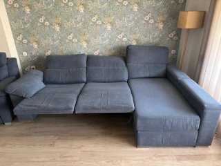 Sofá modular azul y sillón