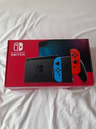 Nintendo Switch + 2 Juegos + Caja y Accesorios