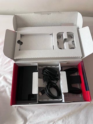Nintendo Switch + 2 Juegos + Caja y Accesorios
