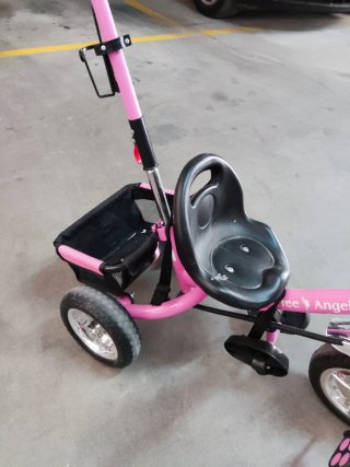 Triciclo niña rosa con empujador