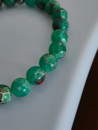 Bracciale elastico acciaio e pietra verde