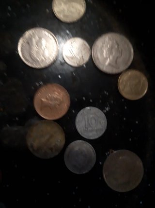 Lote de monedas extranjeras esas y muchas mas