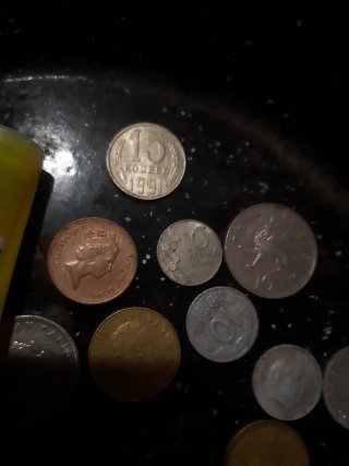 Lote de monedas extranjeras esas y muchas mas