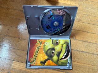 2 Juegos PS2: El Planeta del Tesoro y Shrek 2