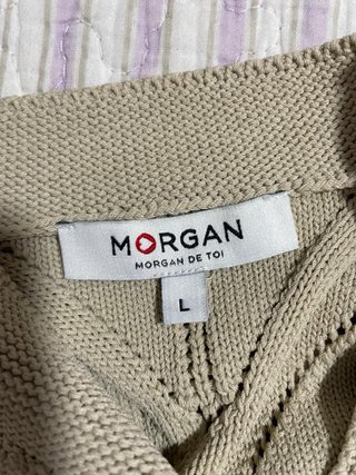 Top de punto beige sin mangas