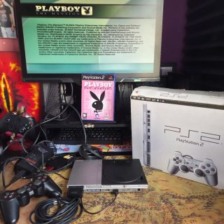 PlayStation 2 slim plateada
