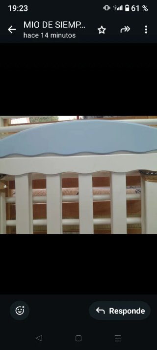 Cuna de madera blanca
