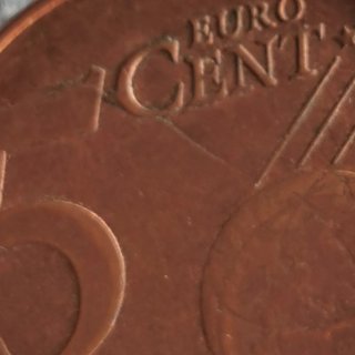 Moneda Bélgica con exceso de metal
