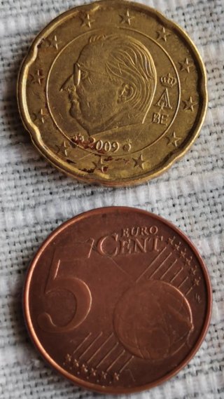 Moneda Bélgica con exceso de metal