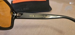 Gafas de sol Meller negras y naranjas