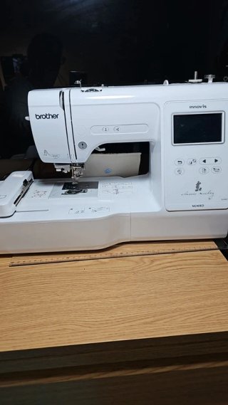 Máquina Brother m240ed