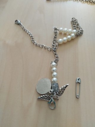 Abaniquero Virgen del Rocío Plata Perlas se ven y