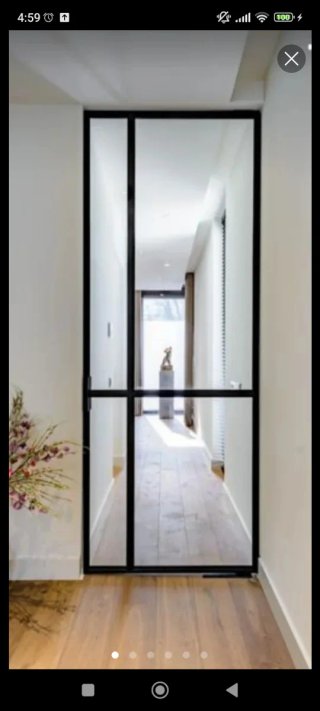 Puerta hierro y cristal