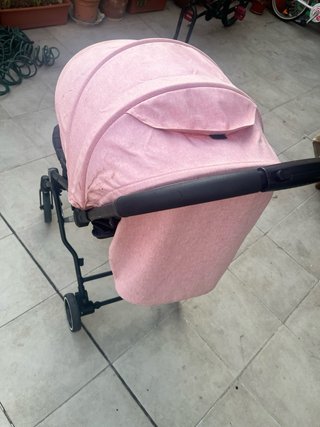 Cochecito bebé rosa y negro