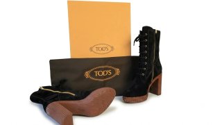 Botas Tod's altas acordonadas ante negro