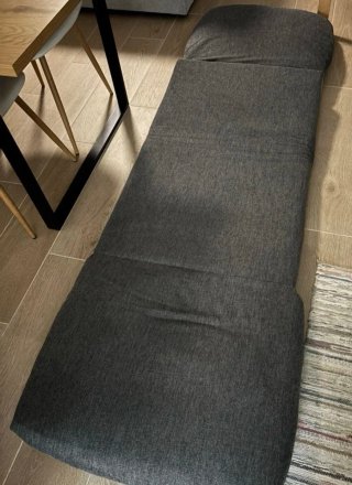 Sillón cama gris tela