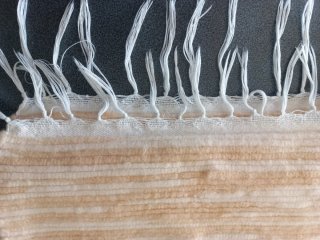 Tappeto beige e bianco