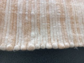 Tappeto beige e bianco