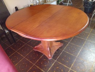 Mesa de comedor redonda de madera