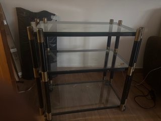 Mesa auxiliar cristal y metal dorado