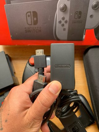 Nintendo Switch + Pack Mandos Pro + MSD 64 + Funda