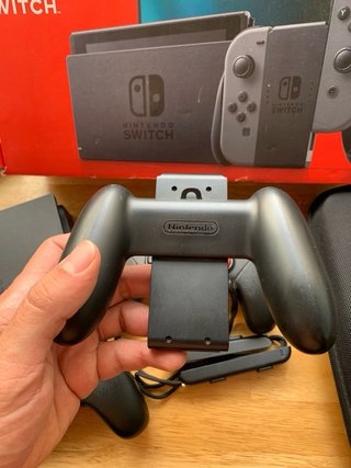 Nintendo Switch + Pack Mandos Pro + MSD 64 + Funda