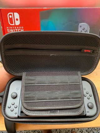 Nintendo Switch + Pack Mandos Pro + MSD 64 + Funda