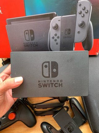 Nintendo Switch + Pack Mandos Pro + MSD 64 + Funda