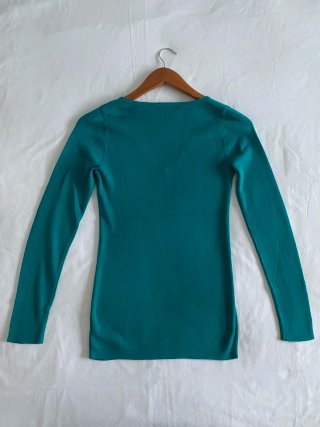 Jersey ajustado de punto teal con cuello en V
