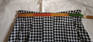 Falda plisada Inside negra y blanca Talla L