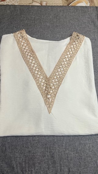 Blusón blanco con detalles de encaje