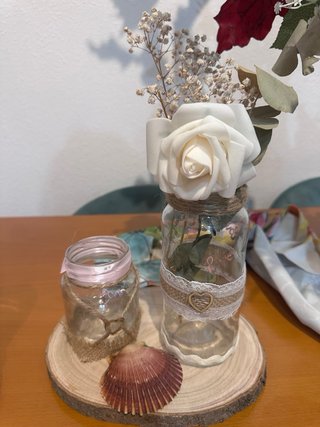 Centros de mesa rústicos con flores y conchas