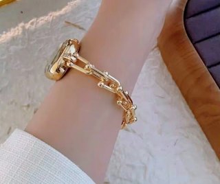 Reloj NAIDU dorado estilo joya