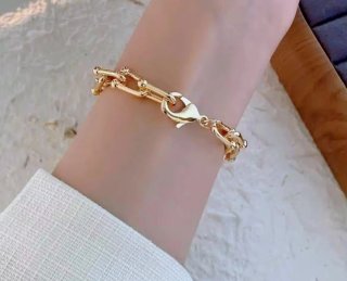 Reloj NAIDU dorado estilo joya