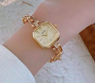 Reloj NAIDU dorado estilo joya
