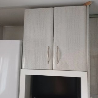 Muebles de cocina gris y verde