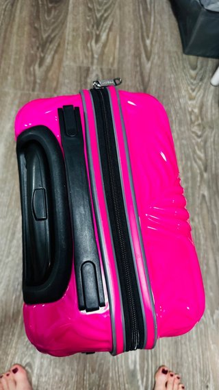 Maleta de cabina rosa con diseño de hojas