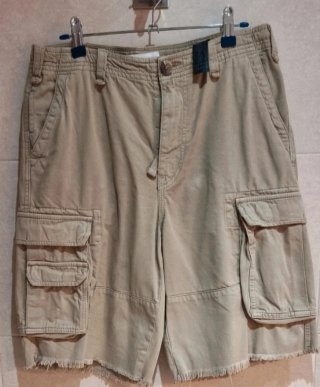 Bermudas Zara multibolsillos chica beige