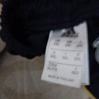 Pantalón chándal Real Madrid negro y amarillo