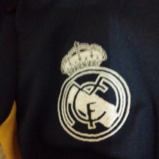 Pantalón chándal Real Madrid negro y amarillo