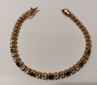 Pulsera b. Oro 18k, plata ley 925 con 42 zafiros