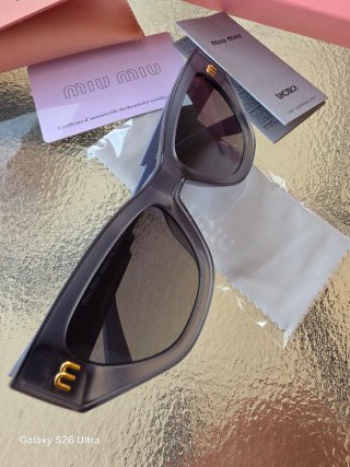 Gafas de sol Miu Miu grises