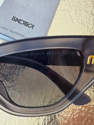 Gafas de sol Miu Miu grises