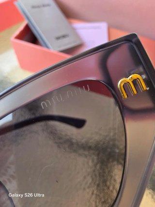 Gafas de sol Miu Miu grises