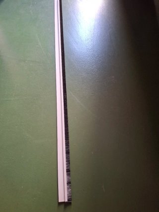 Tira cepillo bajo puerta 1m
