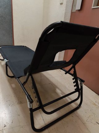 Tumbona plegable negra