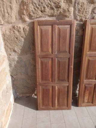Porticones de madera para ventana balconera